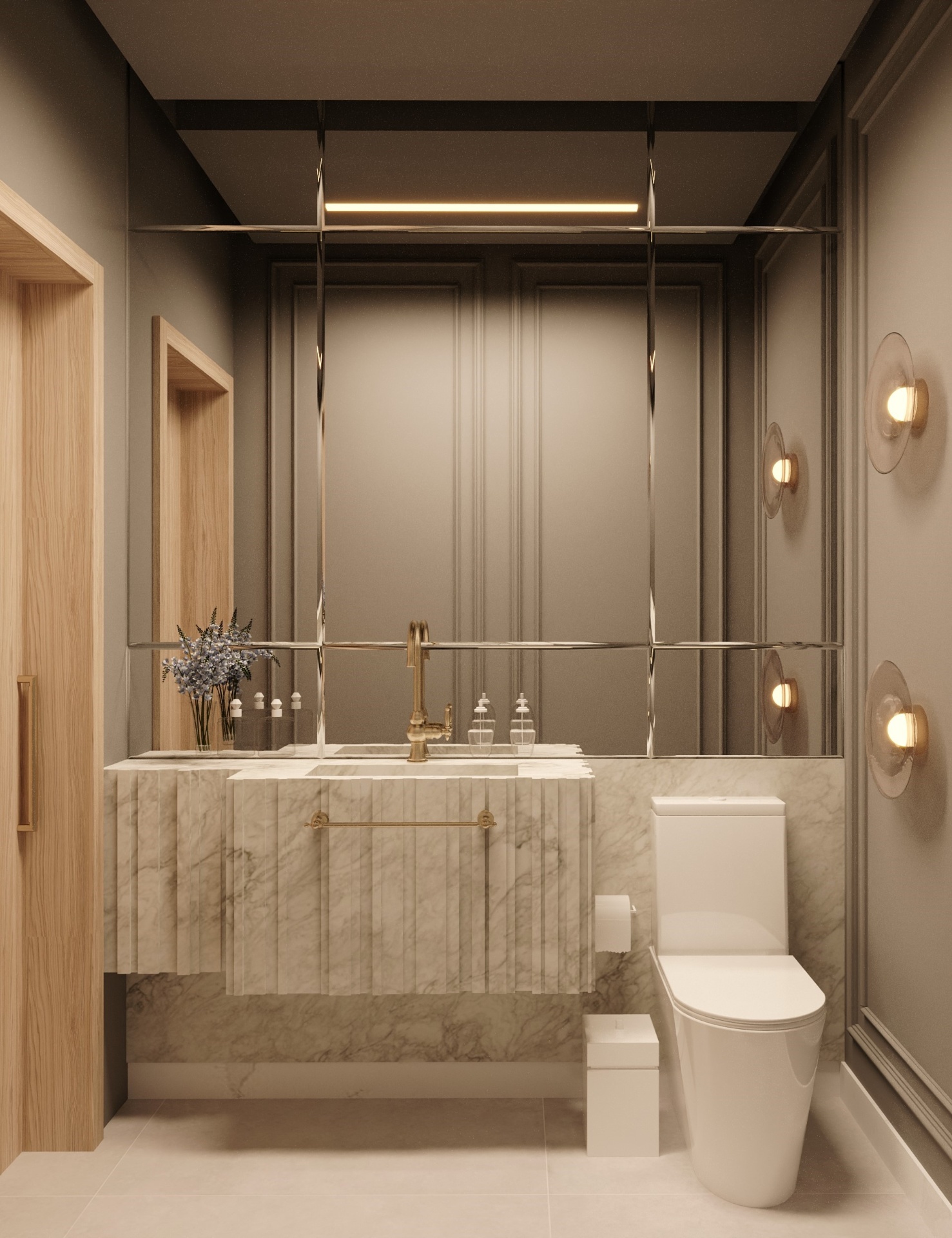 Lavabo com acabamento em mármore e detalhes em metal dourado